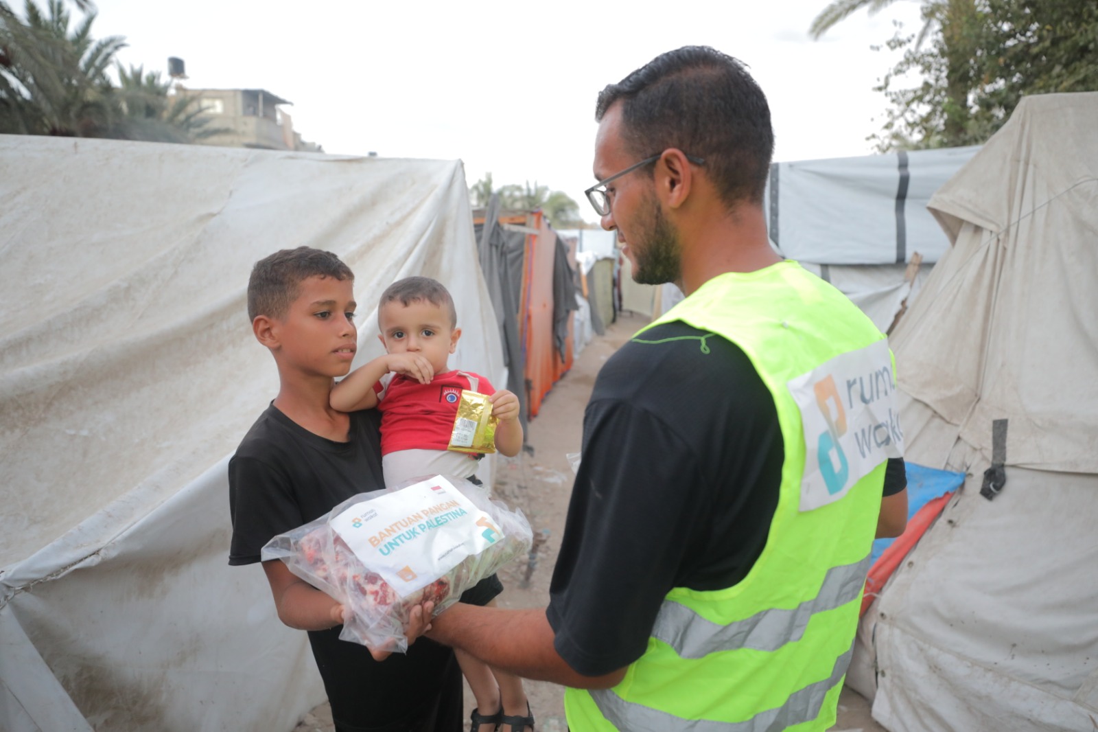 Handing aid directly to children and families.